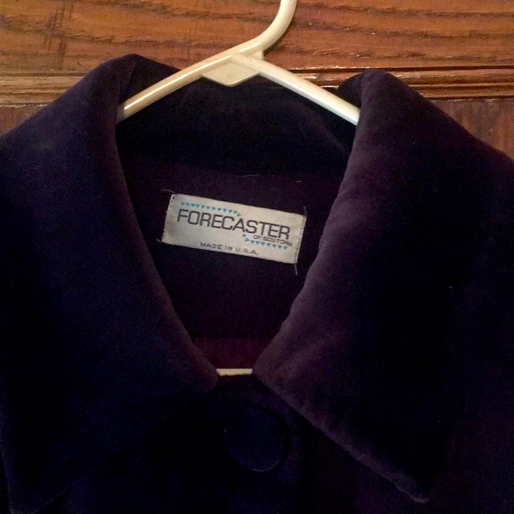 Lightly used plum colored long wool coat. Very warm.